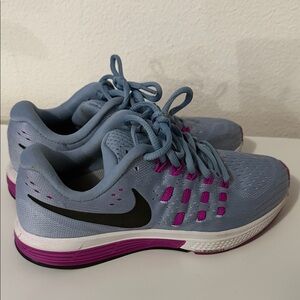 Nike Women's Light Blue Running Shoes with Purple Accents